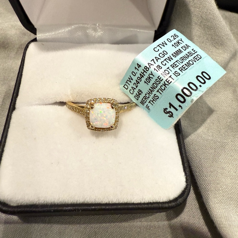 Gold and White Gemstone Ring with Prong Setting